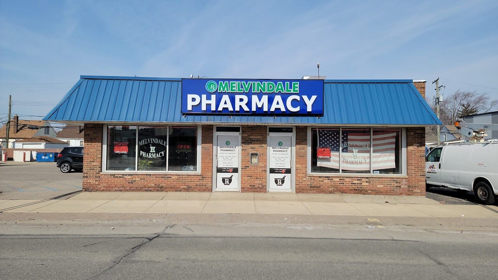 The front of Melvindale Pharmacy seen from across Allen Road